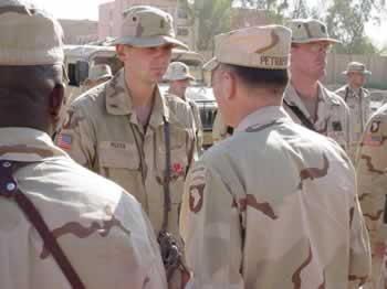 Lt. Jonathan D. Rozier receives the Bronze Star for Valor from General David Petraeus